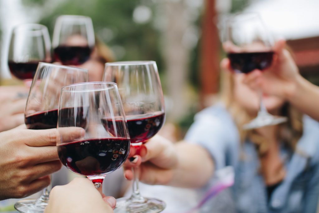 friends sharing glasses of Sangiovese