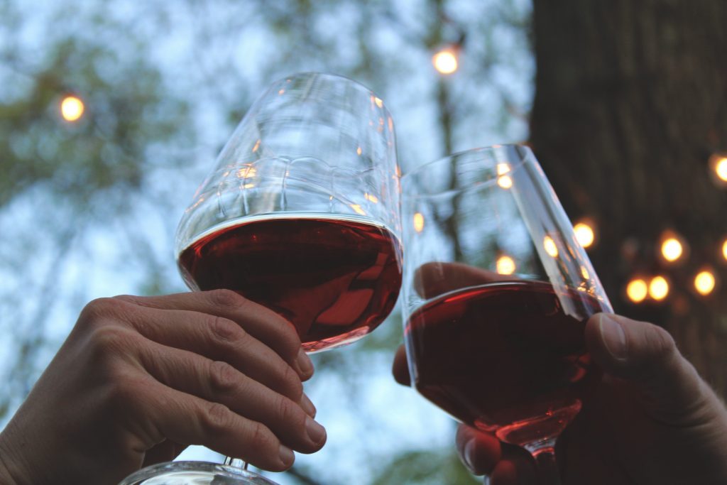 sharing wine at a tasting