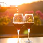 wine pouring in the sunset