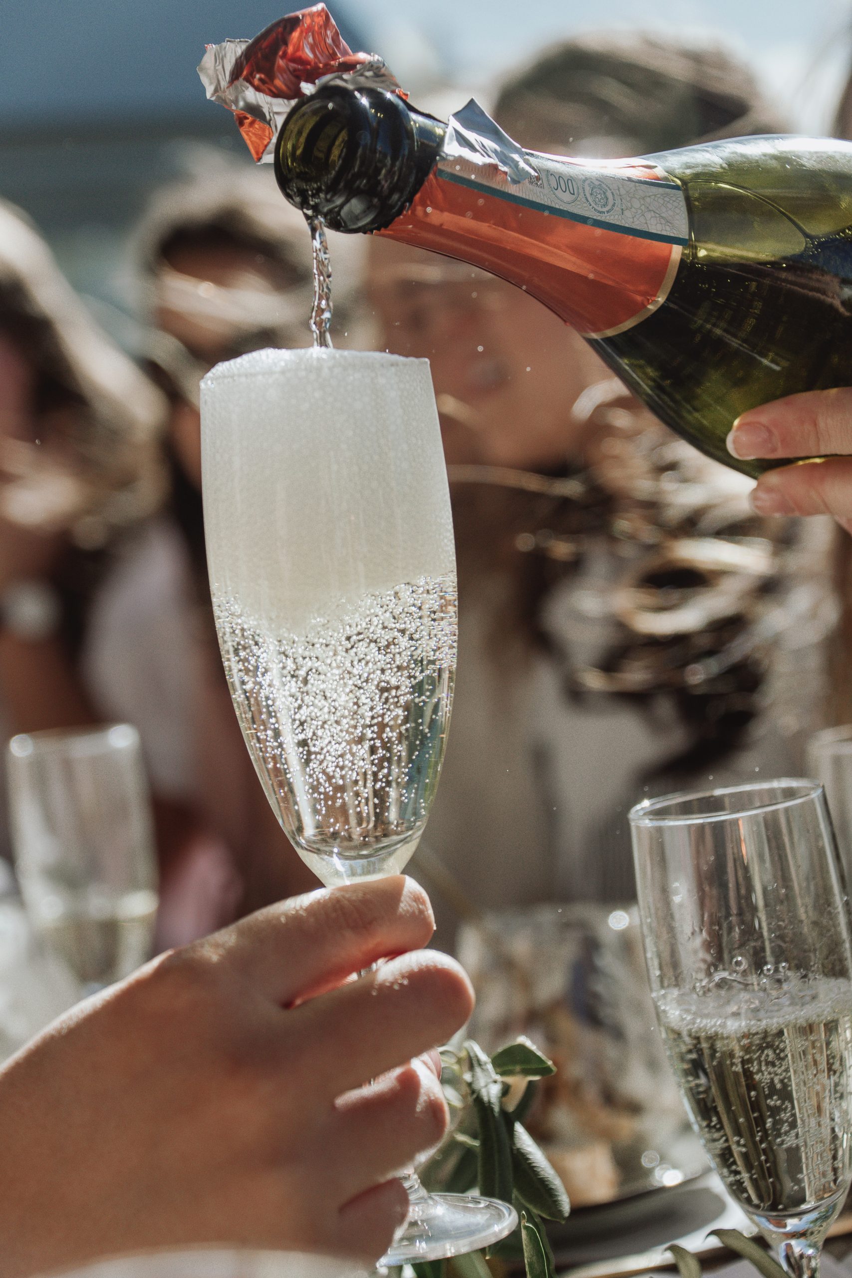 Prosecco sparkling wine poured into flute to celebrate New Years