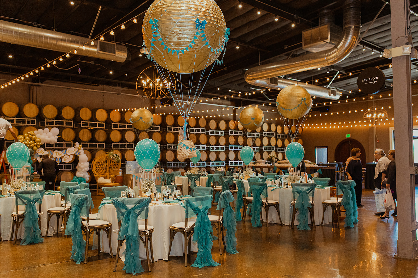 A blue and white table and venue decor in the Cask Room at Domenico Winery San Carlos